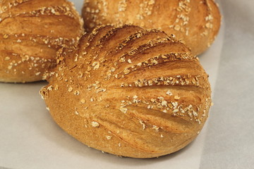  fresh homemade bread  on paper background.