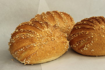  fresh homemade bread  on paper background.
