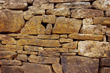 Structure of a stone wall. Background of a stone laying. Stone Wall