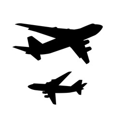 Black silhouettes of two planes.