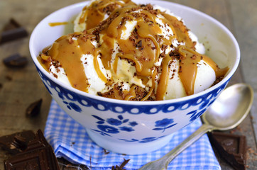 Vanilla ice cream with caramel and chocolate.