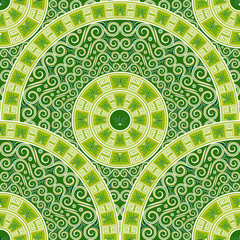 Ethnic decorative seamless pattern from circles ornament in shades of green.