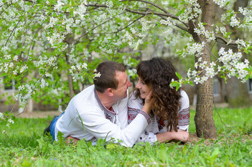 a man and woman go for a walk on nature in spring love