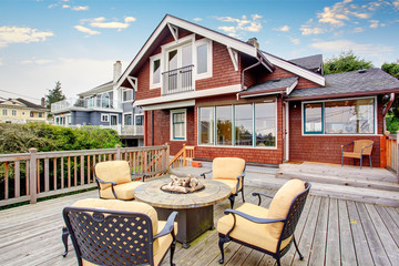 Perfect back deck with yellow chairs.