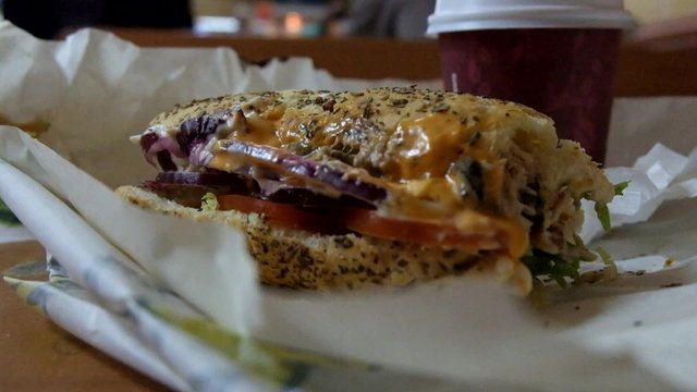 Biten sandwich on a table