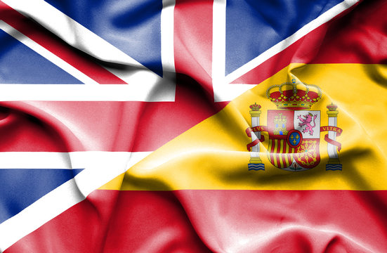 Waving flag of Spain and Great Britain