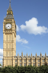 Fototapeta na wymiar Big Ben London clock tower houses of parliament building deep blue summer sky photo vertical