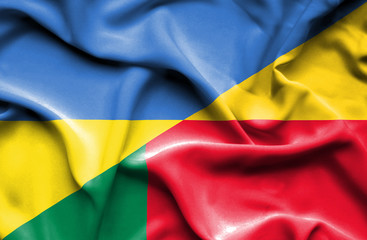 Waving flag of Benin and Ukraine
