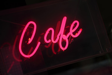 Vivid pink neon cafe sign
