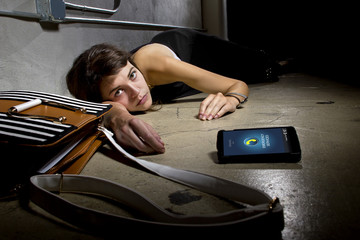 female victim or with medical emergency calling for help with cell phone