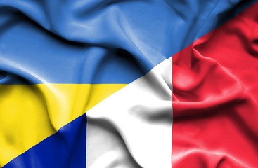 Waving flag of France and Ukraine