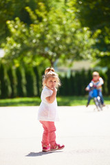 little girl have fun in park