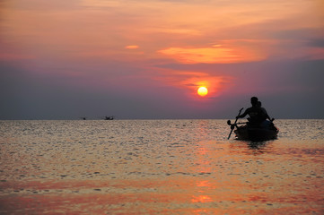 kayak at the sea on sunset