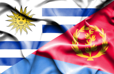 Waving flag of Eritrea and Uruguay