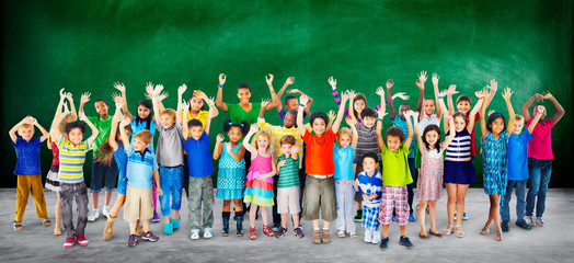 Obraz premium Multi-Ethnic Group of Children Holding Empty Billboard