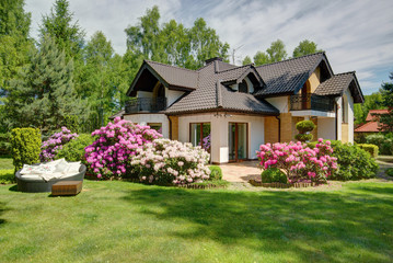 Fototapeta Beautiful village house with garden obraz