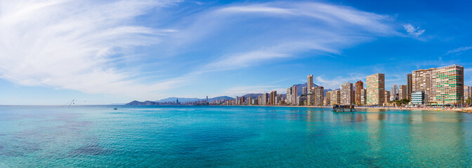 Panorama of the coast city with sea and sky