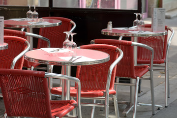 Tables and chairs set up for lunch outside cafe in Bordeaux, France