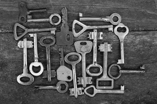 Keys locks wooden background