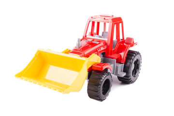 Fototapeta premium red toy tractor on a white background