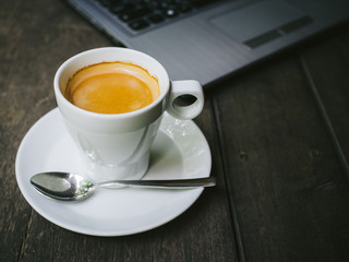 cup of coffee latte on the wood texture