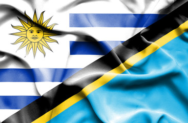 Obraz premium Waving flag of Tanzania and Uruguay