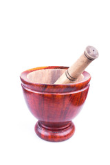 wooden mortar and pestle isolated on white background