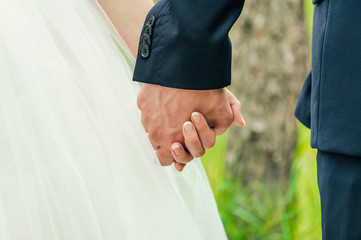 bride and groom to hold hands