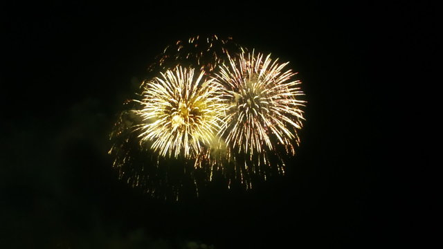 Multiple fireworks exploding high in the air. FullHD 1080p.