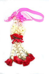 Jasmine garland with red rose buds