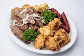 Grilled shish kebabs and sausages