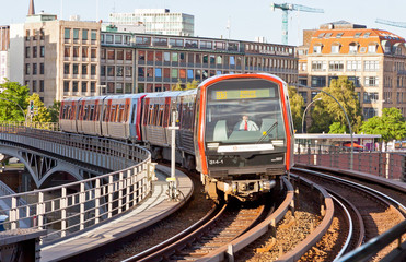 Fototapeta na wymiar Train arrives at U-Bahn Station in Hamburg, Germany