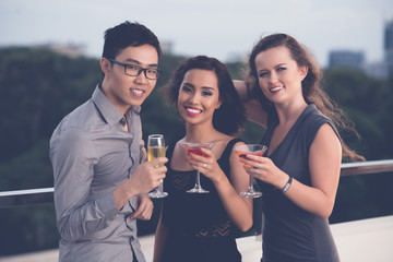 Friends with cocktails