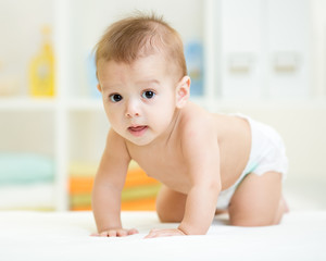cute crawling child boy at home