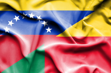Waving flag of Benin and Venezuela
