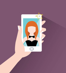 Redhead girl makes selfie on smart phone