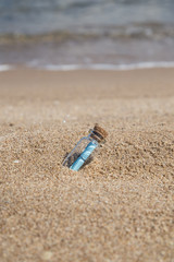 message in a bottle on beach