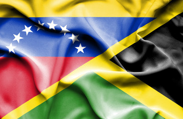 Waving flag of Jamaica and Venezuela
