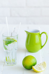 Healthy lifestyle concept still life with refreshing lime lemonade