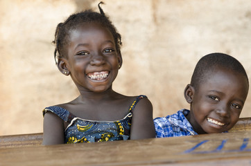 Happiness Symbol: Couple of African Children Laughing at School
