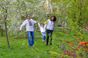 happy Ukrainian family father mother and daughter