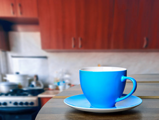 Blue cup on the kitchen table
