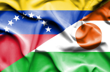 Waving flag of Niger and Venezuela