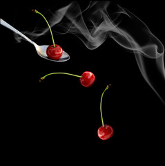 sweet cherry on a black background