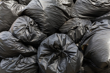 Fototapeta na wymiar Pile of Full Garbage Bags