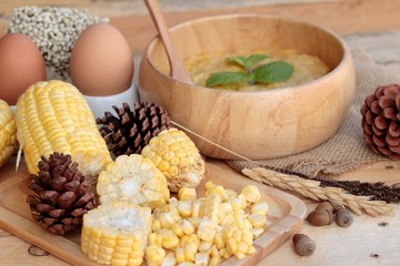 Corn soup of condensed in a wooden bowl