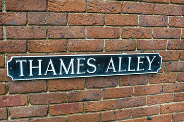 Street Sign on a Brick Wall