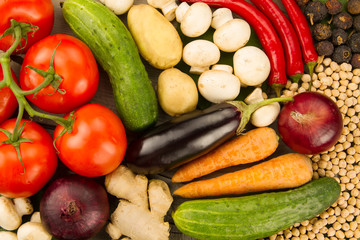 ripe fresh vegetables on wooden background. The icon for healthy eating, diets, weight loss.