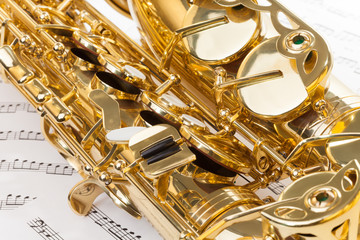 Shiny alto saxophone with detailed view of keys