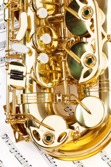 Naklejka premium View of shiny alto saxophone bow part with keys
